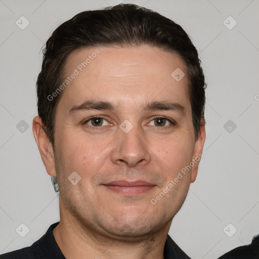 Joyful white adult male with short  brown hair and brown eyes