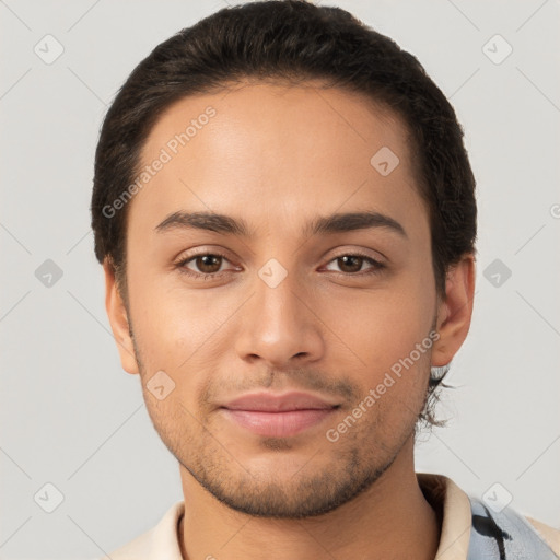 Joyful white young-adult male with short  brown hair and brown eyes