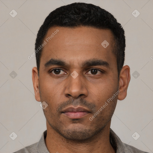 Neutral latino young-adult male with short  black hair and brown eyes