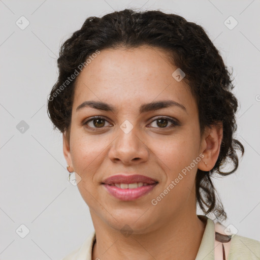 Joyful latino young-adult female with short  brown hair and brown eyes