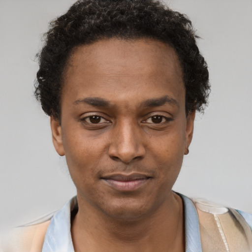 Neutral latino young-adult male with short  brown hair and brown eyes