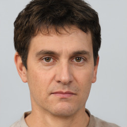 Neutral white adult male with short  brown hair and brown eyes