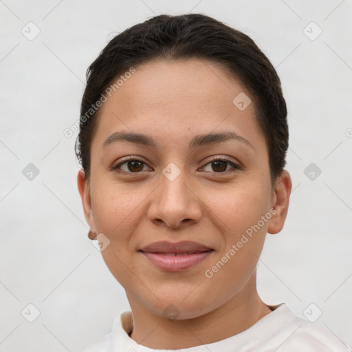 Joyful white young-adult female with short  brown hair and brown eyes