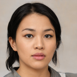 Neutral asian young-adult female with medium  black hair and brown eyes