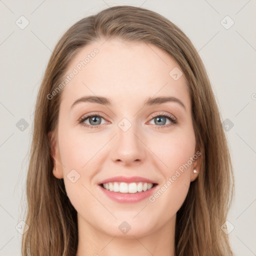 Joyful white young-adult female with long  brown hair and grey eyes