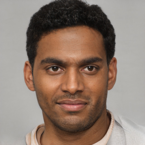 Neutral black young-adult male with short  black hair and brown eyes