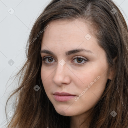 Neutral white young-adult female with long  brown hair and brown eyes