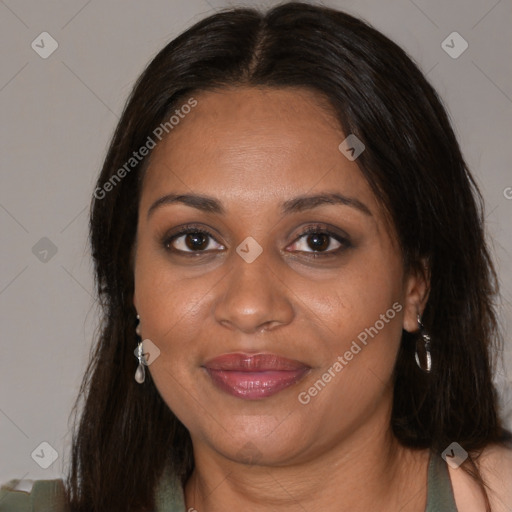 Joyful black adult female with medium  brown hair and brown eyes