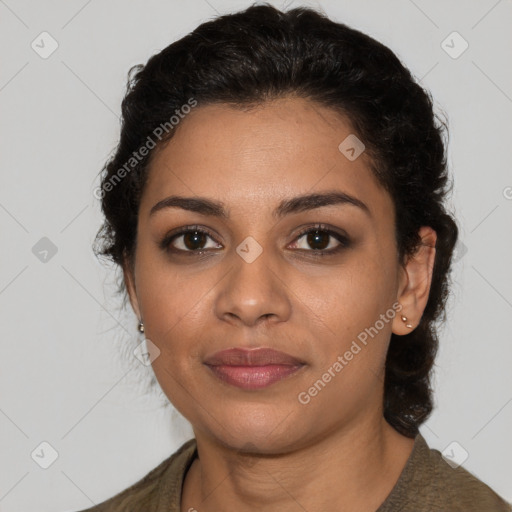 Joyful latino young-adult female with short  black hair and brown eyes