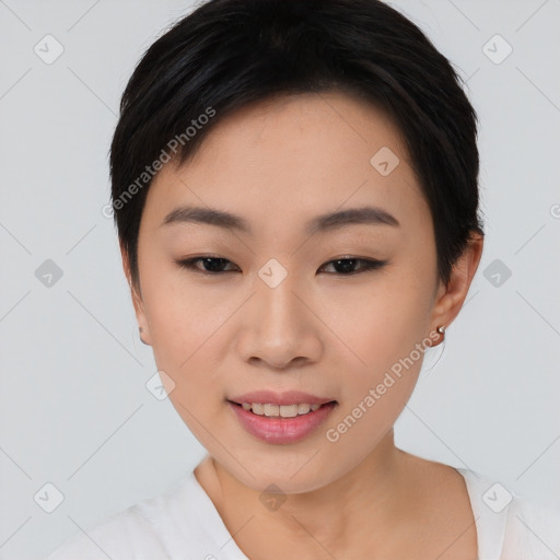 Joyful asian young-adult female with medium  black hair and brown eyes