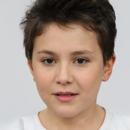 Joyful white child female with short  brown hair and brown eyes