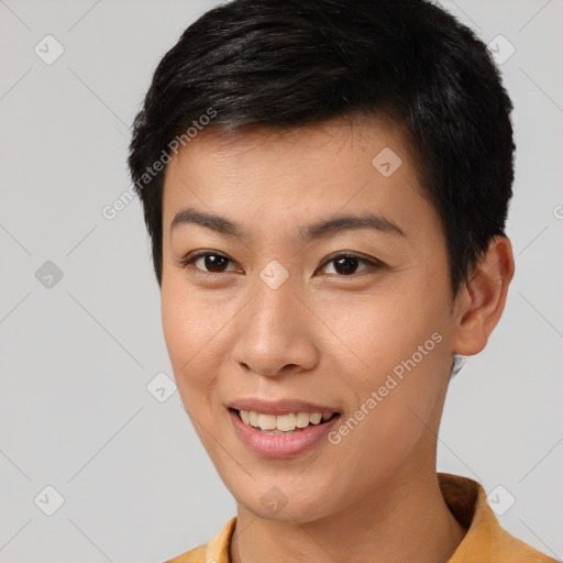 Joyful asian young-adult female with short  brown hair and brown eyes