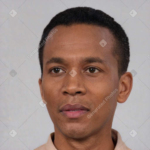 Neutral black young-adult male with short  black hair and brown eyes