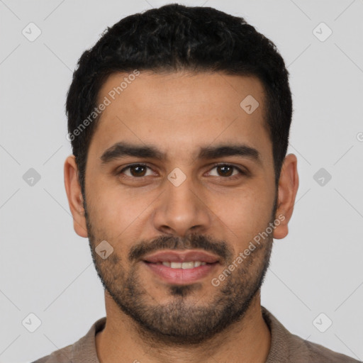 Joyful latino young-adult male with short  black hair and brown eyes