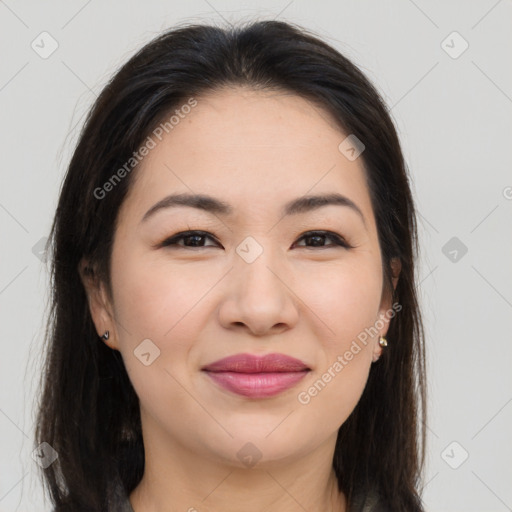 Joyful asian young-adult female with long  brown hair and brown eyes