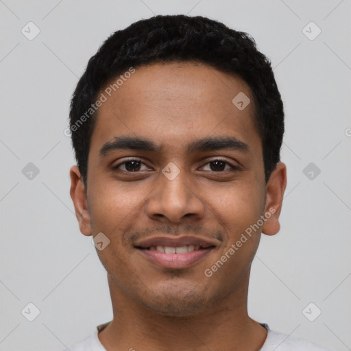 Joyful latino young-adult male with short  black hair and brown eyes