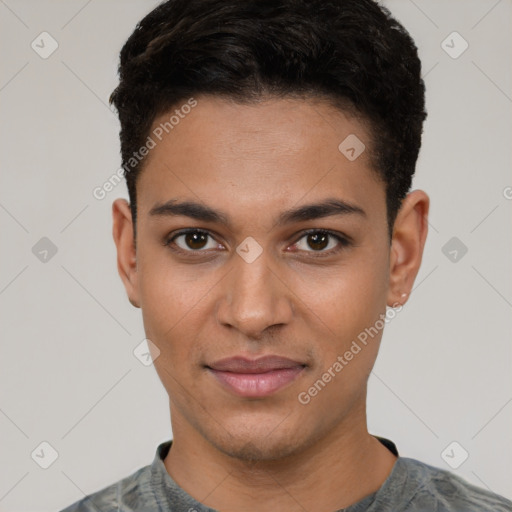 Joyful latino young-adult male with short  black hair and brown eyes