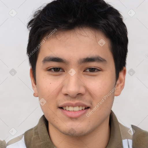 Joyful asian young-adult male with short  brown hair and brown eyes