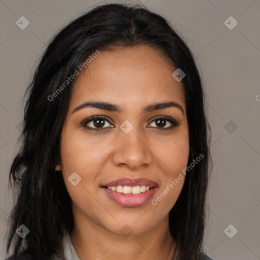 Joyful latino young-adult female with long  brown hair and brown eyes