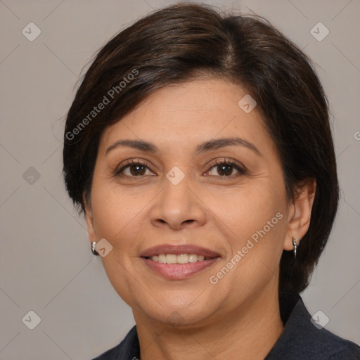 Joyful white adult female with medium  brown hair and brown eyes