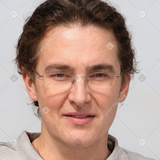 Joyful white adult male with short  brown hair and grey eyes