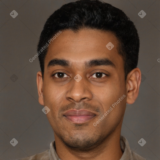 Joyful latino young-adult male with short  black hair and brown eyes