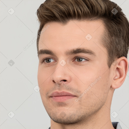 Neutral white young-adult male with short  brown hair and brown eyes