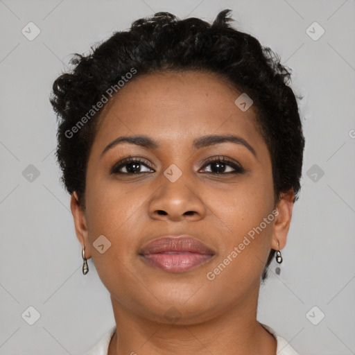 Joyful black young-adult female with short  brown hair and brown eyes