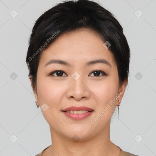 Joyful asian young-adult female with short  brown hair and brown eyes