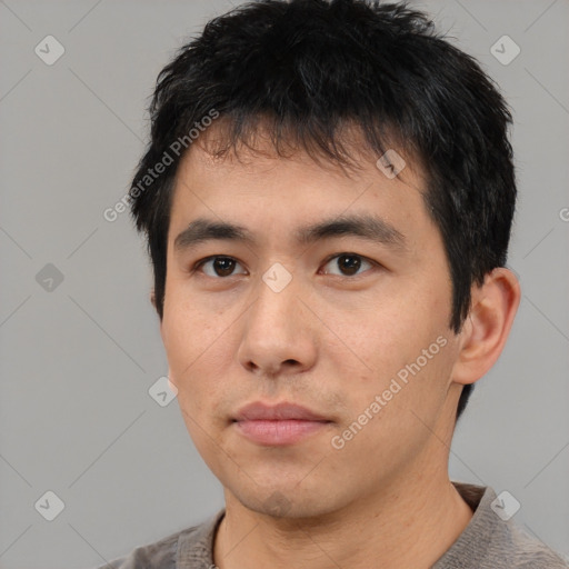 Neutral asian young-adult male with short  black hair and brown eyes