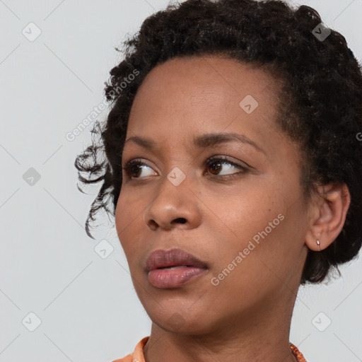 Neutral black young-adult female with short  brown hair and brown eyes