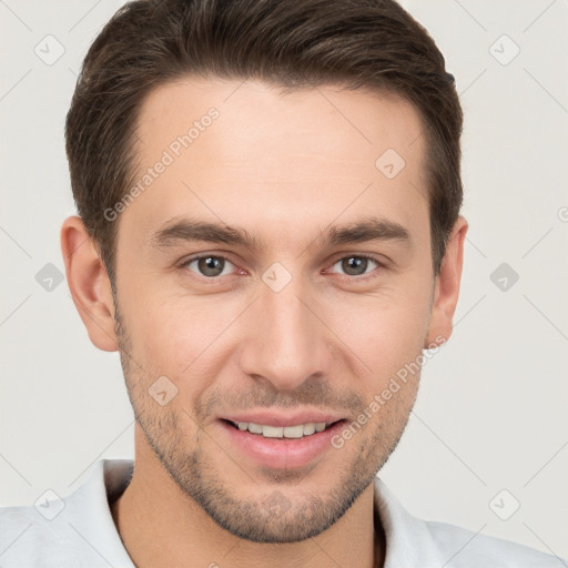 Joyful white young-adult male with short  brown hair and brown eyes