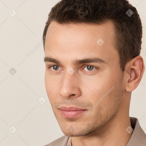 Neutral white young-adult male with short  brown hair and brown eyes