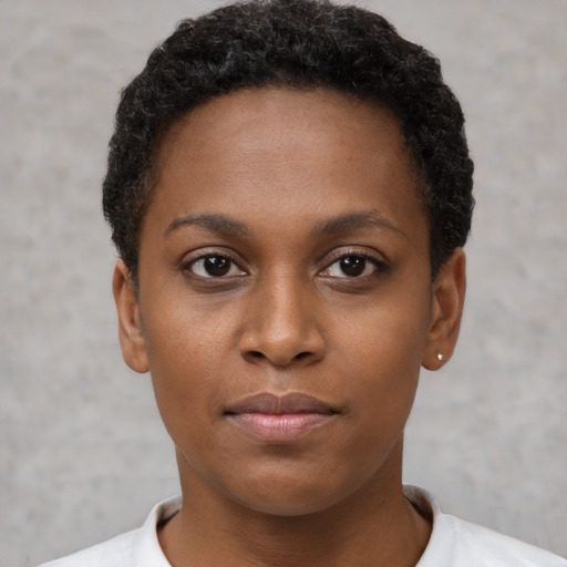 Neutral black young-adult female with short  brown hair and brown eyes