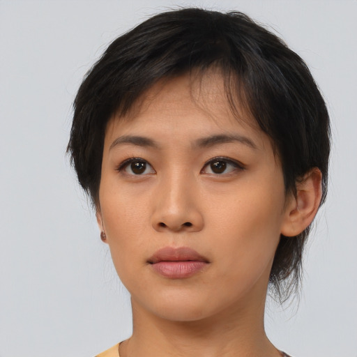 Neutral asian young-adult female with medium  black hair and brown eyes