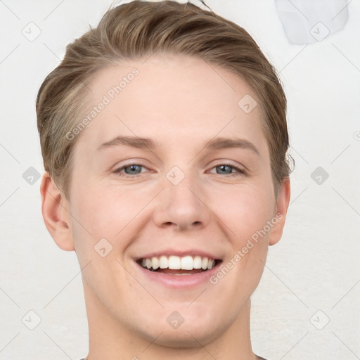 Joyful white young-adult female with short  brown hair and grey eyes