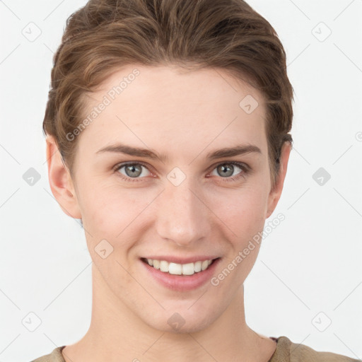 Joyful white young-adult female with short  brown hair and grey eyes