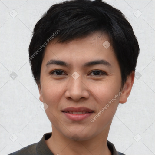 Joyful asian young-adult male with short  black hair and brown eyes