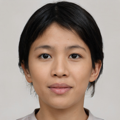 Neutral asian young-adult female with medium  black hair and brown eyes
