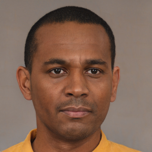 Neutral black young-adult male with short  brown hair and brown eyes