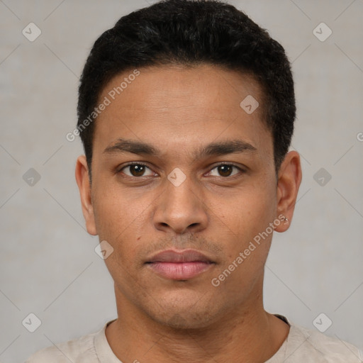 Neutral latino young-adult male with short  black hair and brown eyes