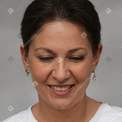 Joyful white adult female with short  brown hair and brown eyes