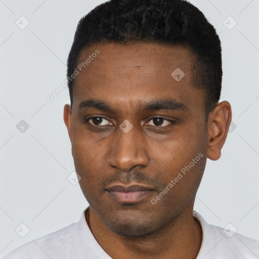 Neutral black young-adult male with short  black hair and brown eyes