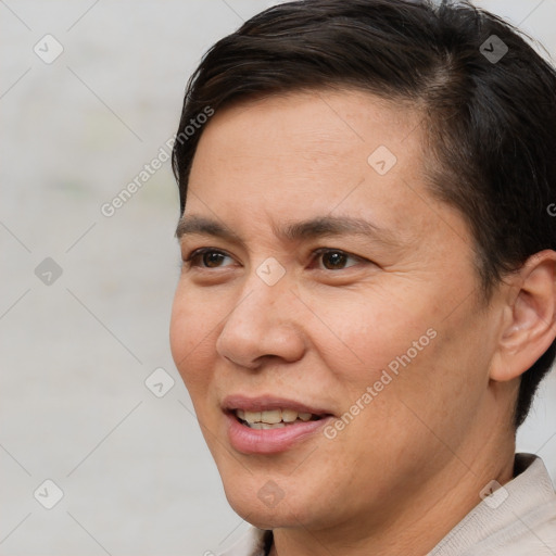 Joyful white adult female with short  brown hair and brown eyes