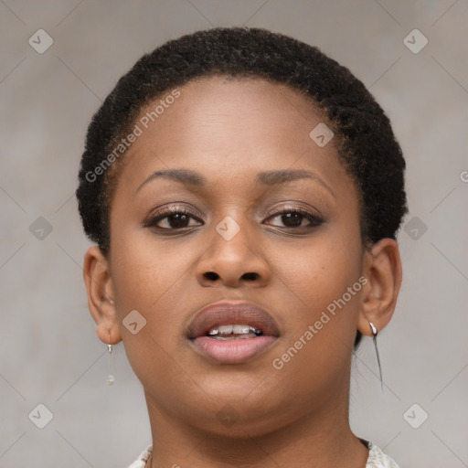 Joyful black young-adult female with short  brown hair and brown eyes