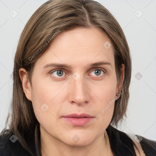 Neutral white young-adult female with long  brown hair and grey eyes