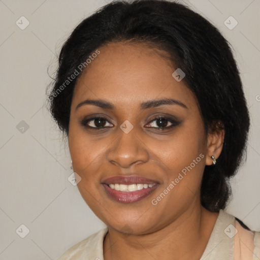 Joyful black young-adult female with medium  brown hair and brown eyes