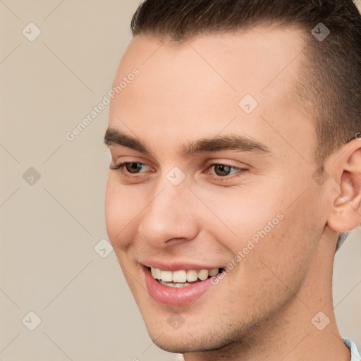 Joyful white young-adult male with short  brown hair and brown eyes