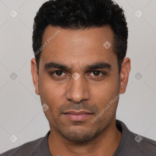 Neutral white young-adult male with short  black hair and brown eyes