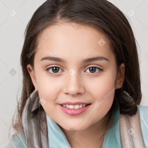 Joyful white child female with medium  brown hair and brown eyes